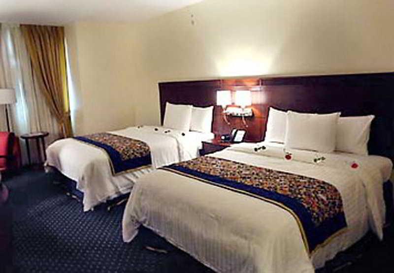 Hodelpa Garden Court Hotell Santiago De Los Caballeros Rom bilde